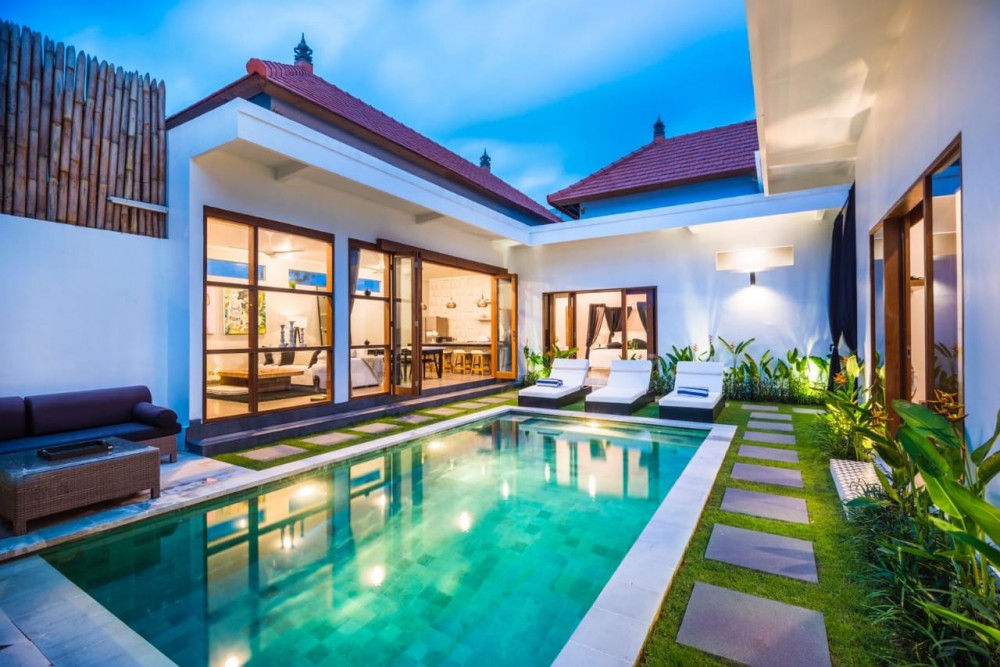 villa Seminyak, with a private pool and lazy chairs, pampering you to enjoy holiday